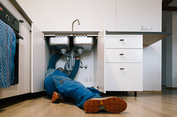 Professional Drain Cleaning technician working in Dalbo, MN
